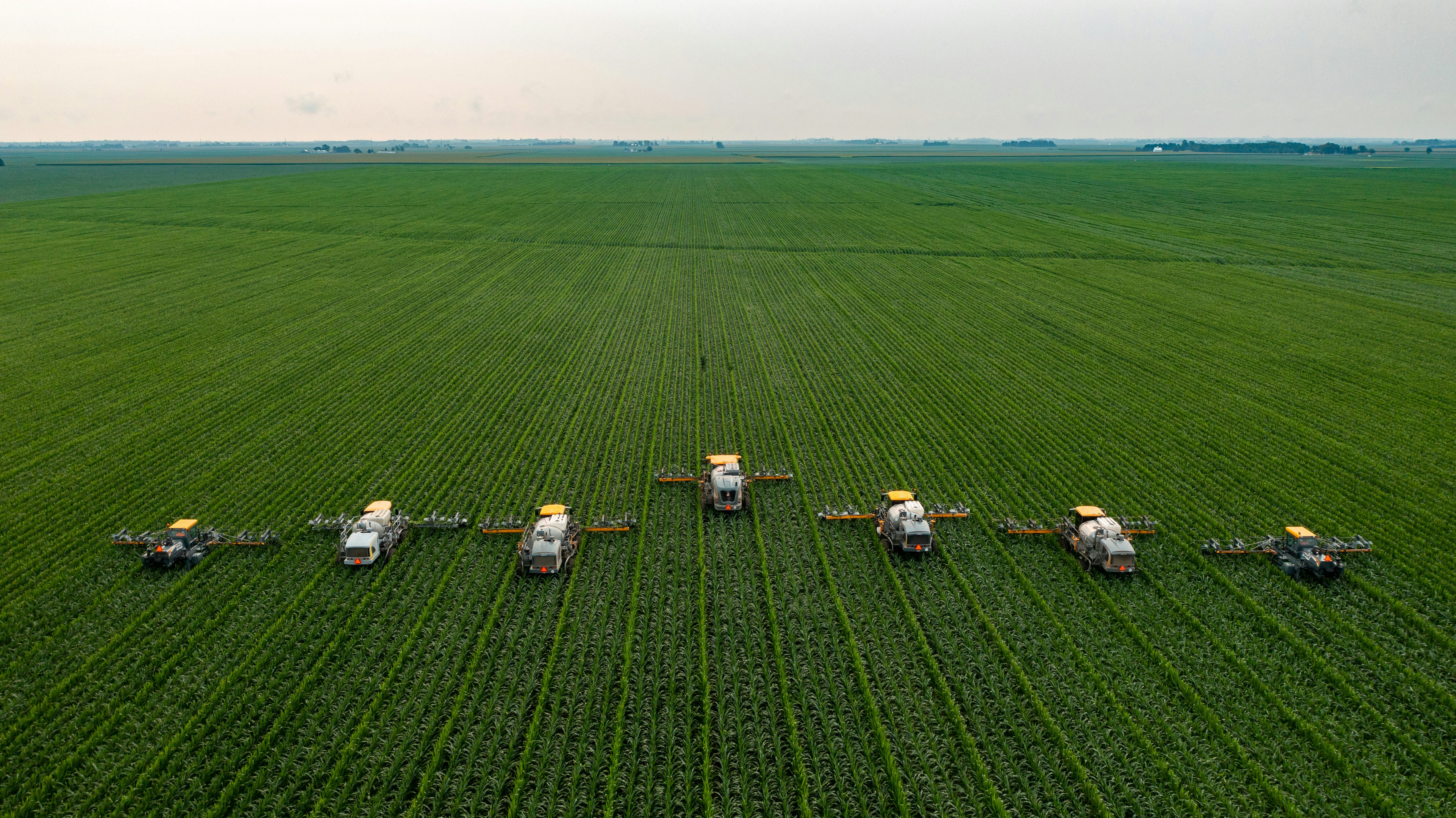 Agricultural field with farming equipment
